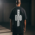 T-shirt noir God Sign porté – Greatness Over Death